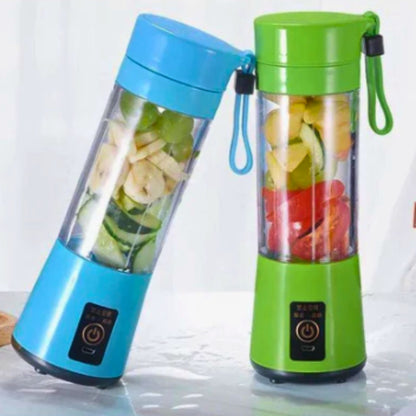 Portable Blender blue and green being used